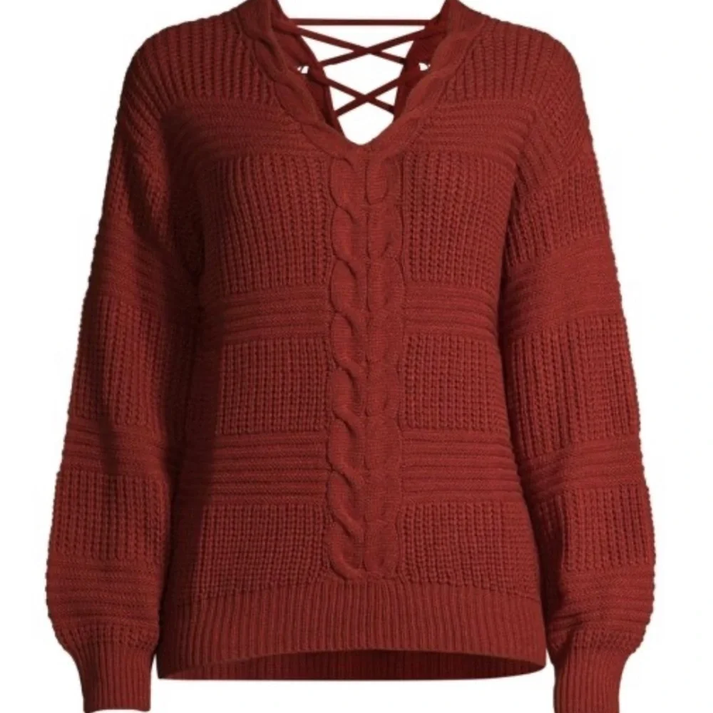 No Boundaries cable knit sweater with lattice back